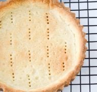 baked pate sucree tart on cooling rack