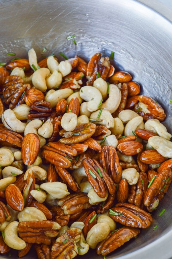 nuts unbaked in bowl with roasting glaze