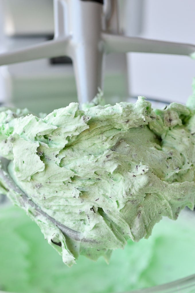 mint chocolate chip frosting in mixer 