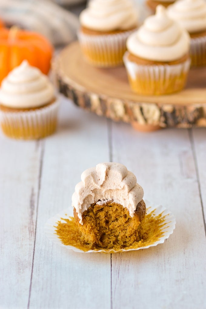 Pumpkin spice cupcake and frosting with bite take out