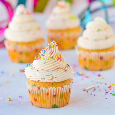 cake batter frosting on cupcakes with sprinkles