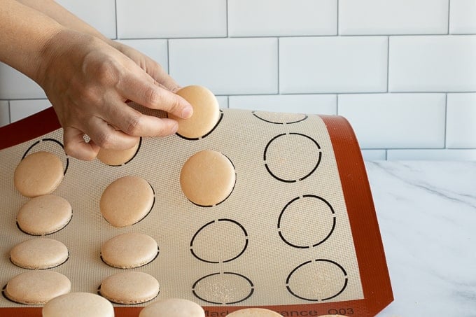 removing white french macaron shells from silicone baking mat 