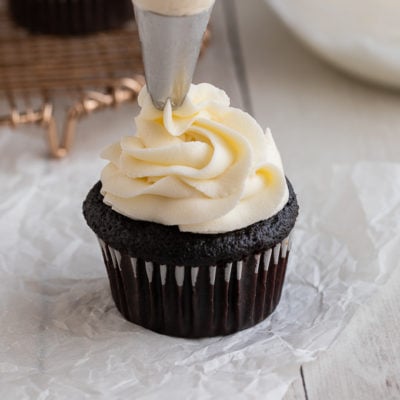 vanilla buttercream piped on cupcake