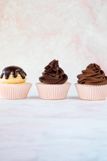 close up of warm, cooled, and whipped ganache on cupcakes