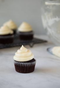 cream cheese frosting on cupcake