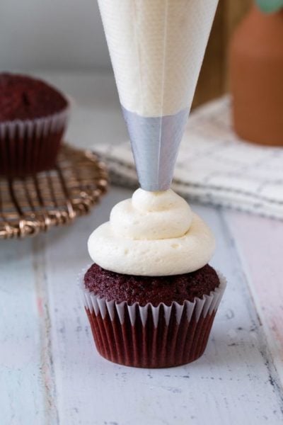 cropped-ermine-frosting-piped-on-cupcake-cropped-2-min.jpg