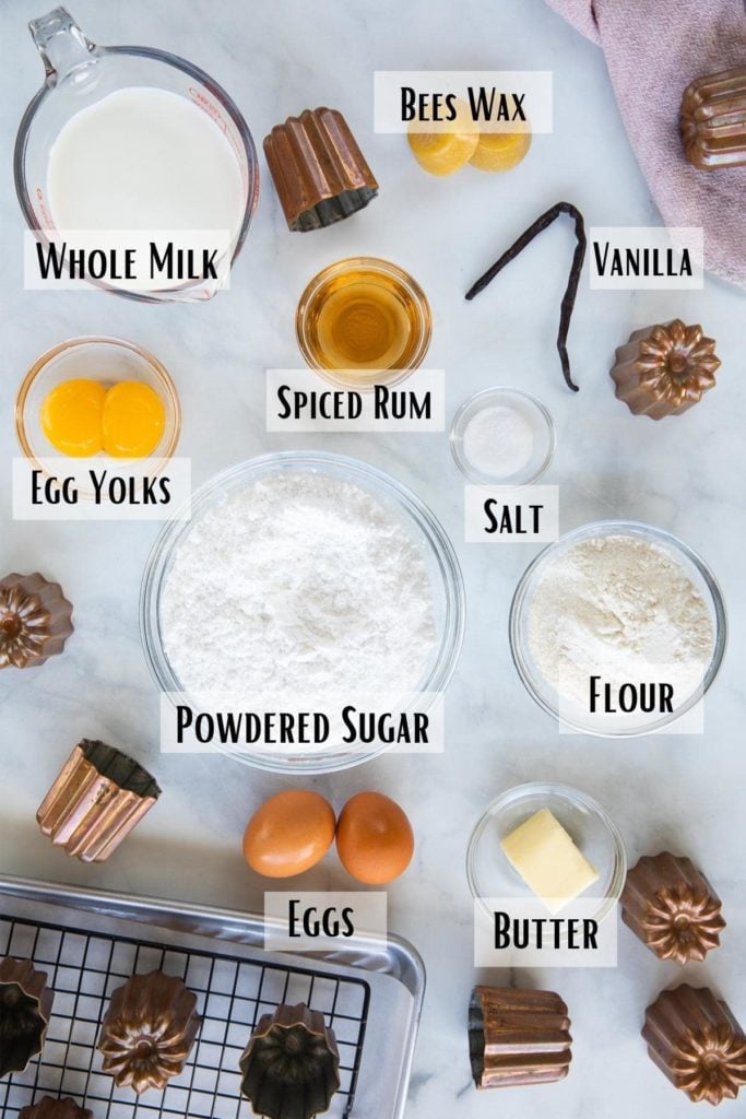french canele ingredients of milk, flour, sugar, salt, eggs, vanilla, rum, butter, beeswax