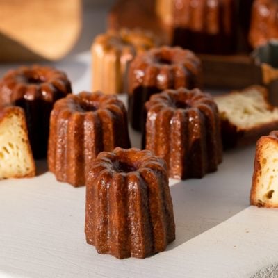 french caneles on serving tray up close