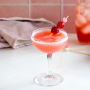 cherry vodka sour shaken in cocktail glass