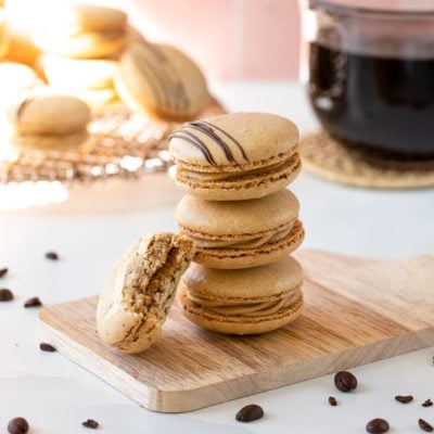 coffee macaron with a bit taken out
