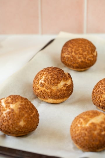 baked choux au craquelin on baking sheet