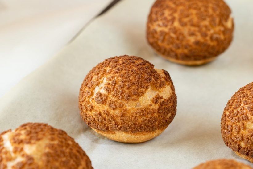 baked choux au craquelin on baking sheet