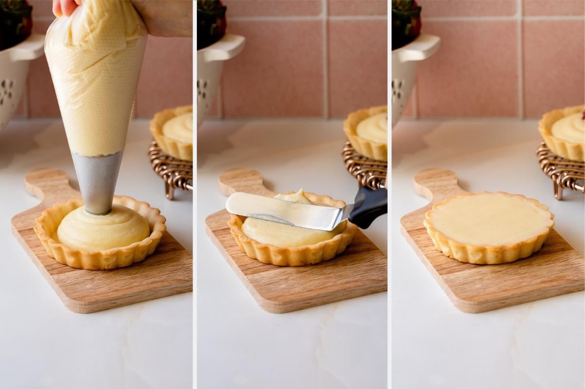 filling mini fruit tarts with pastry cream.