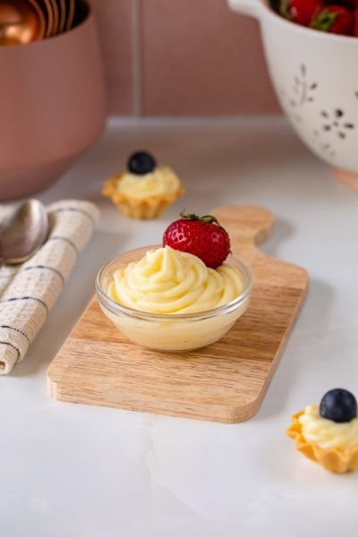 pastry cream in bowl with strawberry