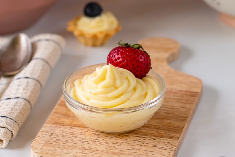 pastry cream in bowl with strawberry
