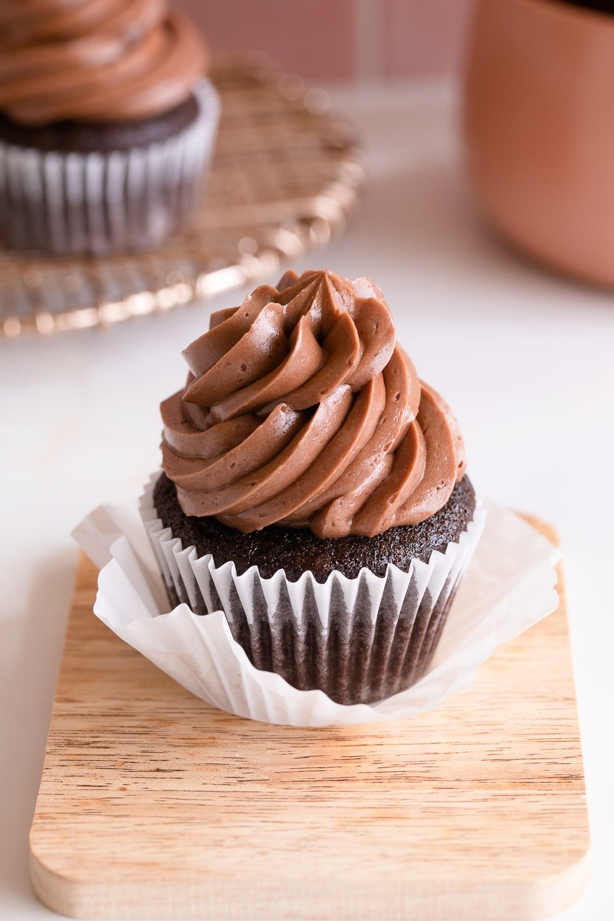 chocolate swiss meringue buttercream on cupcake.