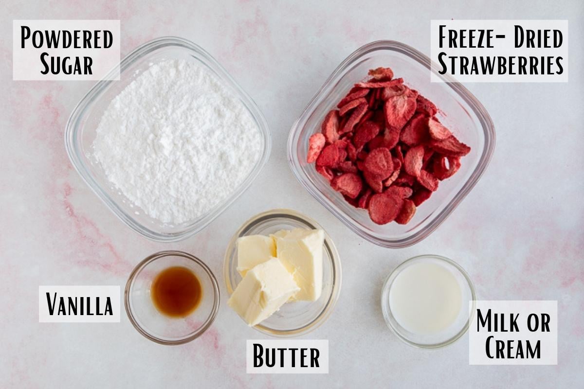 strawberry frosting ingredients of butter, powdered sugar, freeze dried strawberries, vanilla and cream.