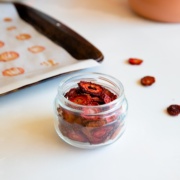 oven dried strawberries in jar.
