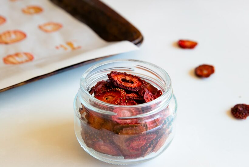 oven dried strawberries in jar.