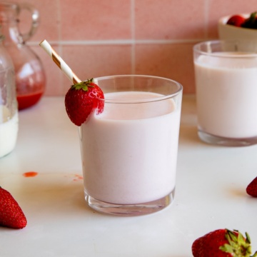strawberry milk in glass.