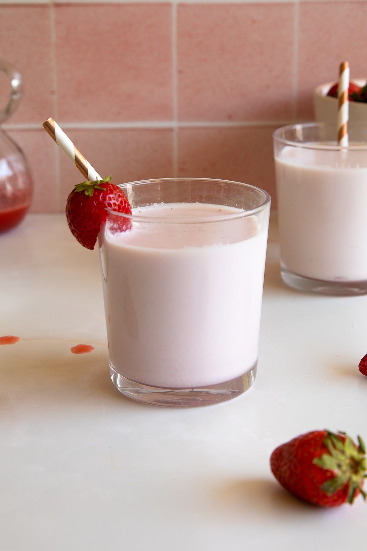 strawberry milk in glass with strawberry.