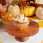 easy pumpkin spice cupcakes with brown sugar frosting and sprinkles up close.