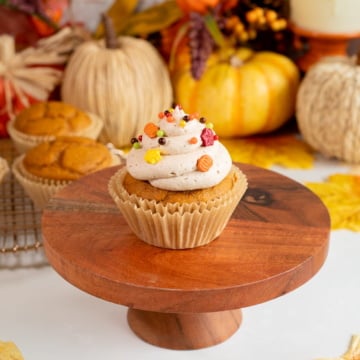 easy pumpkin spice cupcakes with brown sugar frosting and sprinkles up close.