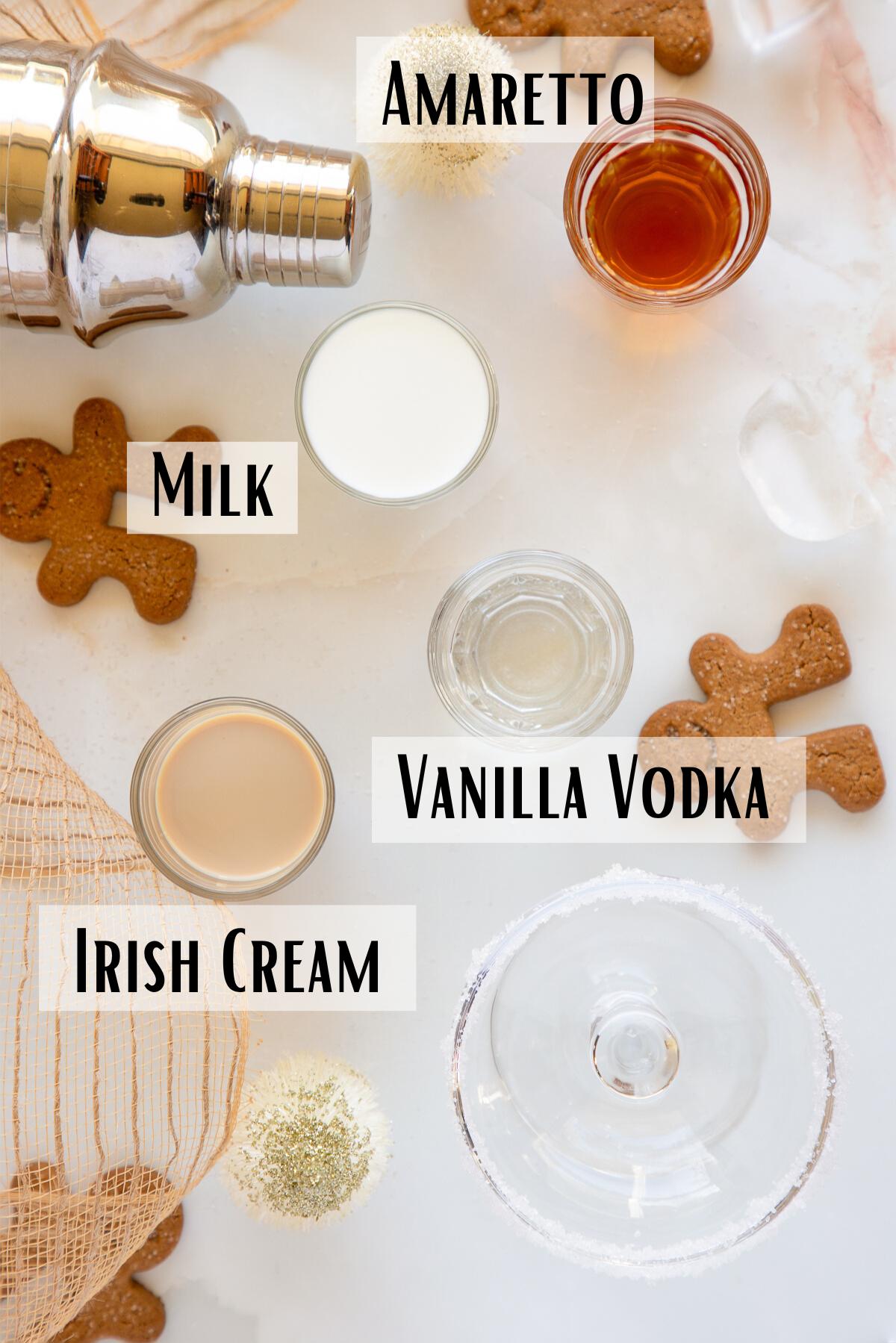 sugar cookie martini ingredients of vanilla vodka, amaretto, Irish cream, and milk. 
