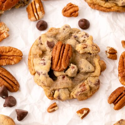chocolate chip pecan cookies on parchment paper.
