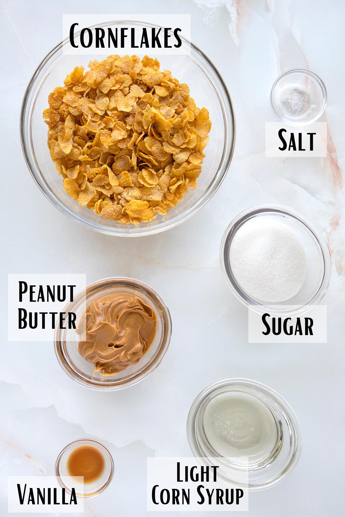 peanut butter cornflake cookies (cornflake candy) ingredients of cornflakes, peanut butter, sugar, corn syrup, salt and vanilla.