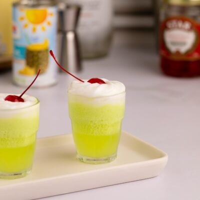 scooby snack shot in shot glasses with whipped cream.