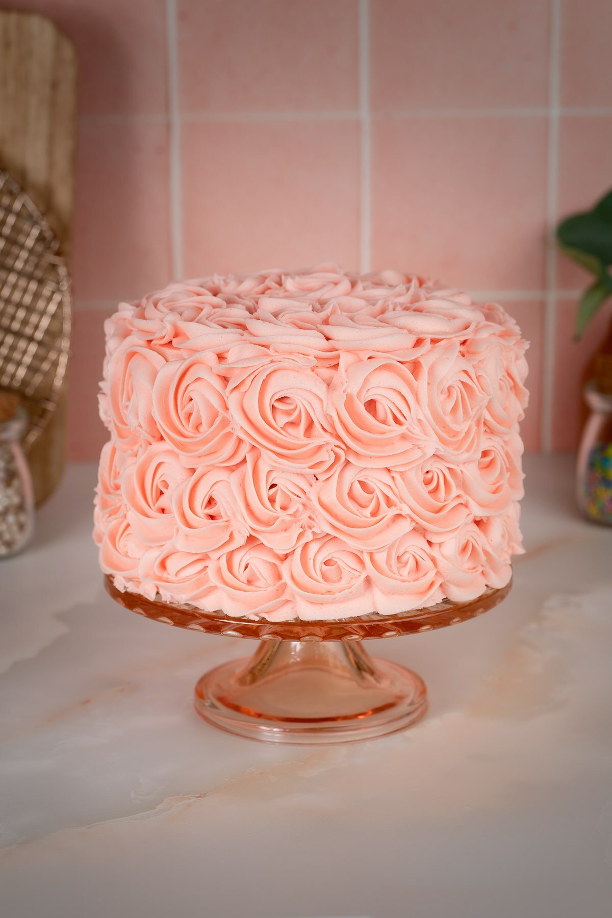 rosette cake on cake stand.