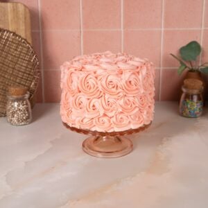 rosette cake on cake stand.