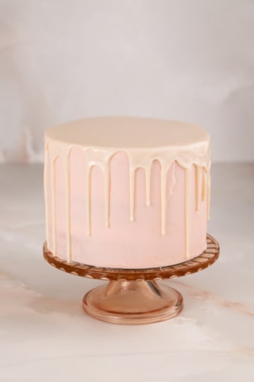 white chocolate drip cake square.