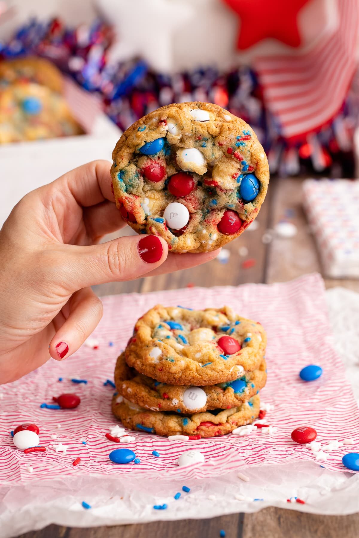 holding a 4th of July cookie.