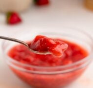 strawberry cake filling on spoon.