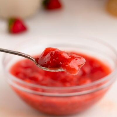 strawberry cake filling on spoon.