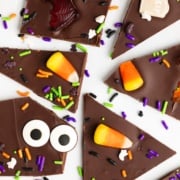 halloween bark cut in pieces on parchment.