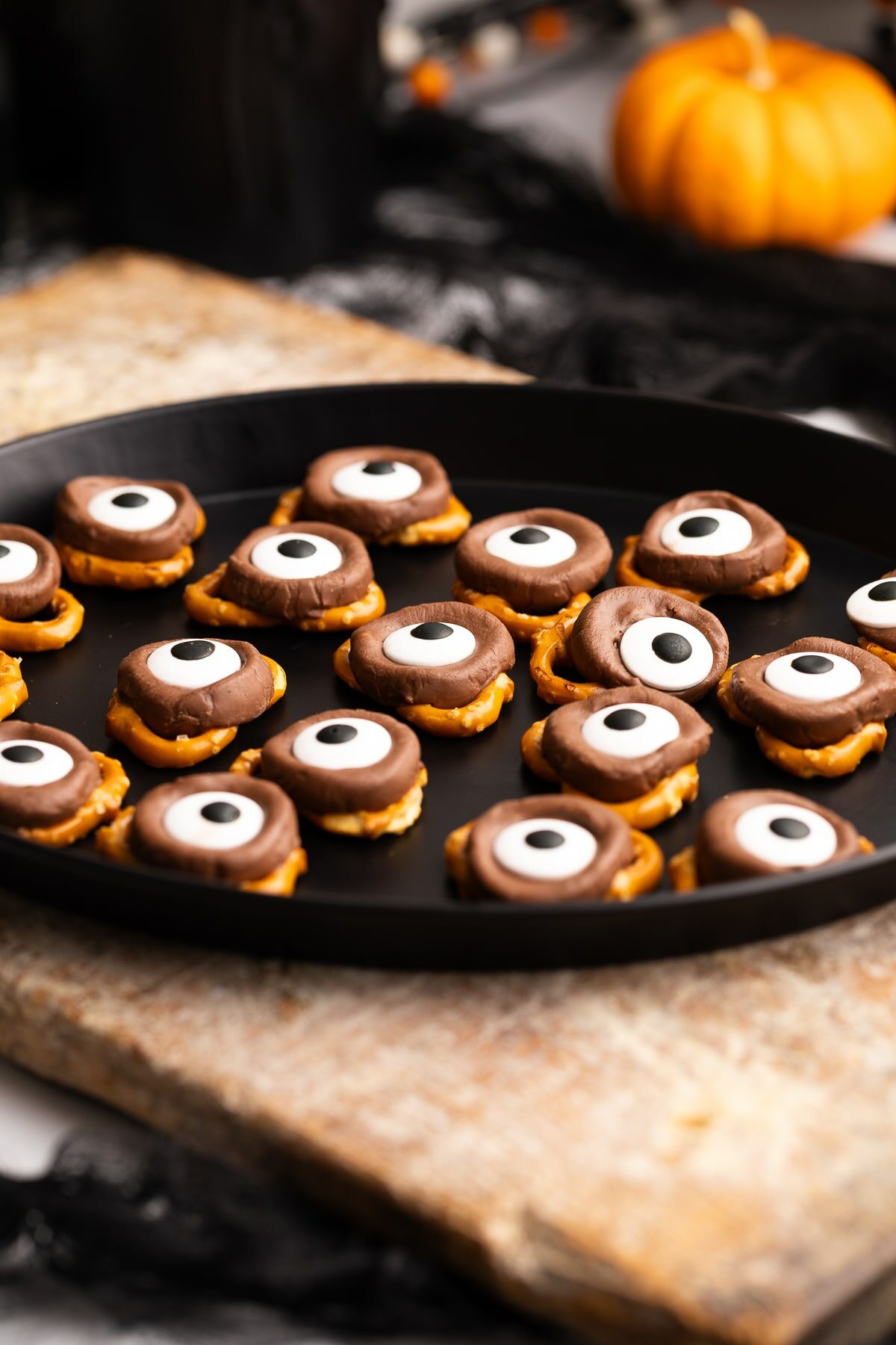 Halloween rolo pretzels on platter.