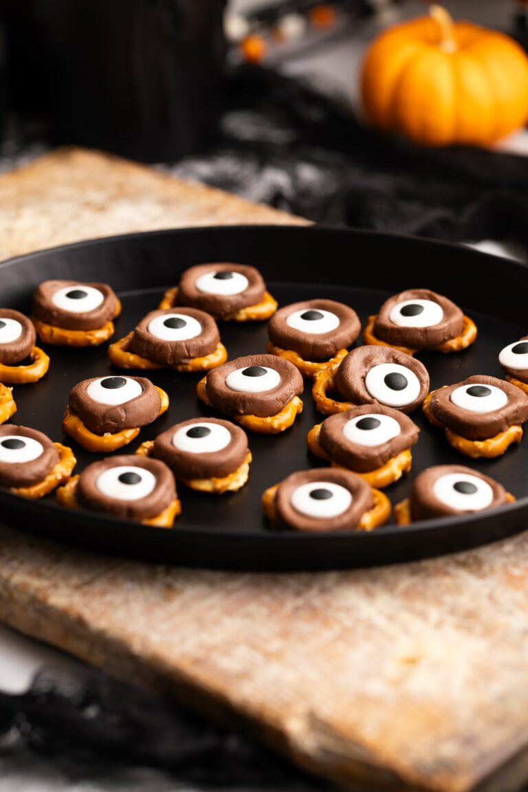 Halloween pretzel treats spiderwebs broomsticks and eyes 