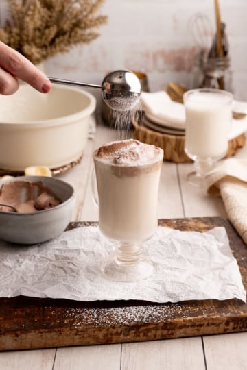 Sprinkling Sugar on Warm Vanilla Milk.