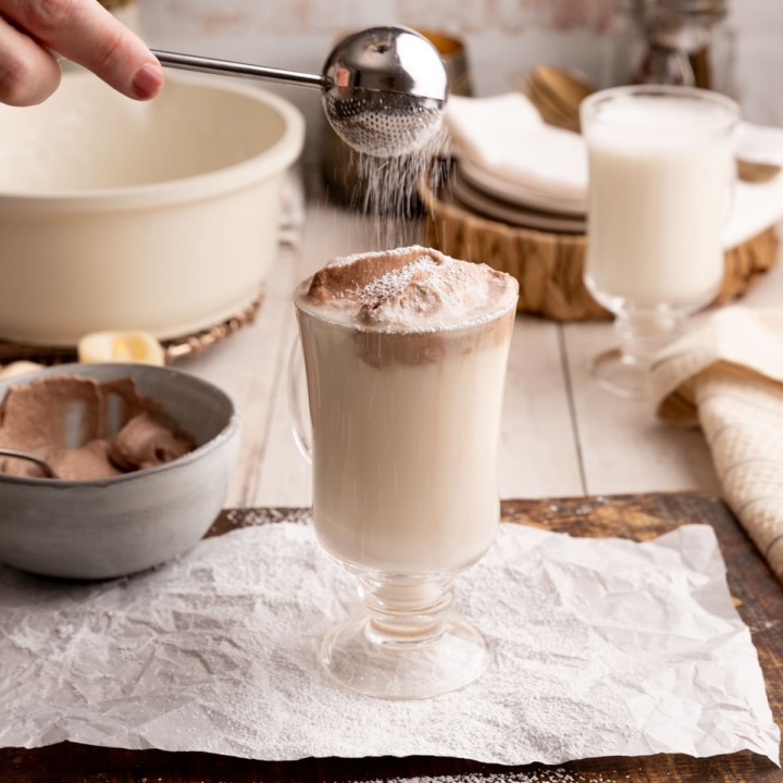 Sprinkling Sugar on Warm Vanilla Milk.