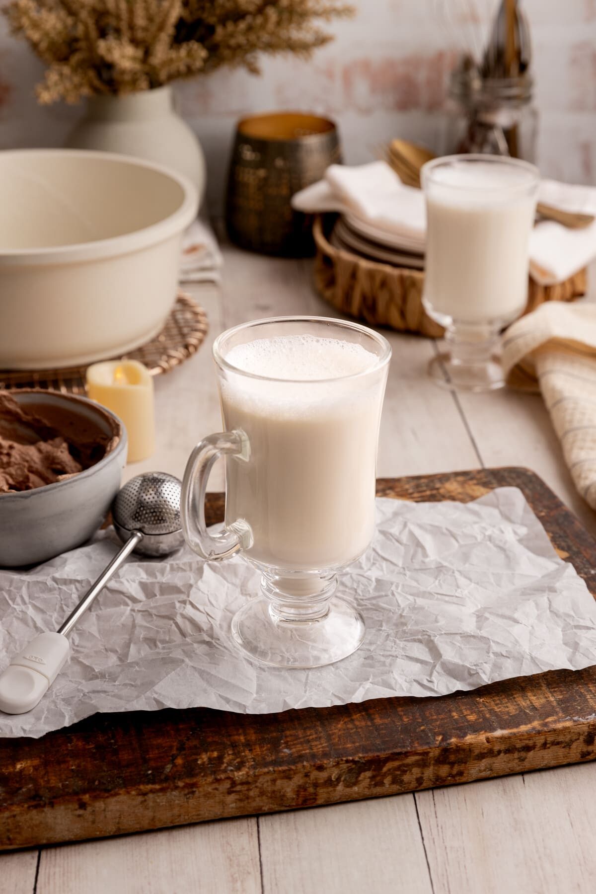 Warm Vanilla Milk in mug on serving tray.
