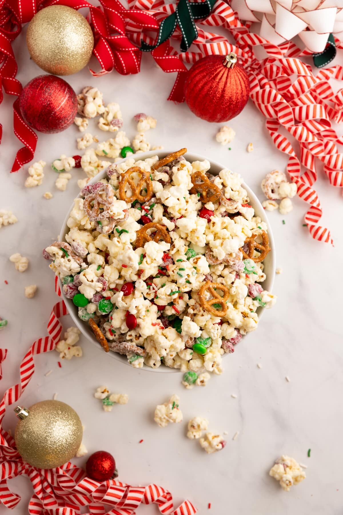 Christmas crunch popcorn in bowl top view.