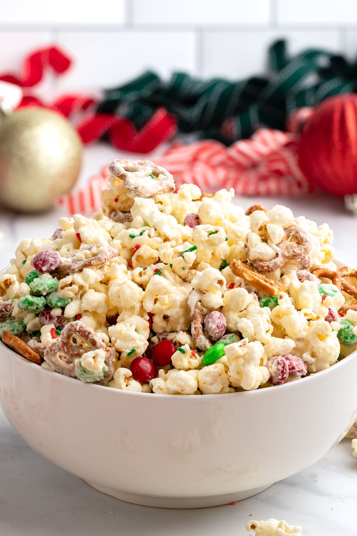Christmas crunch popcorn in bowl up close.