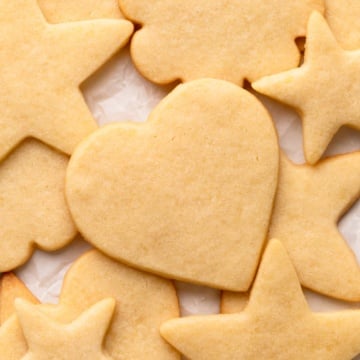 cut on sugar cookies on parchment.