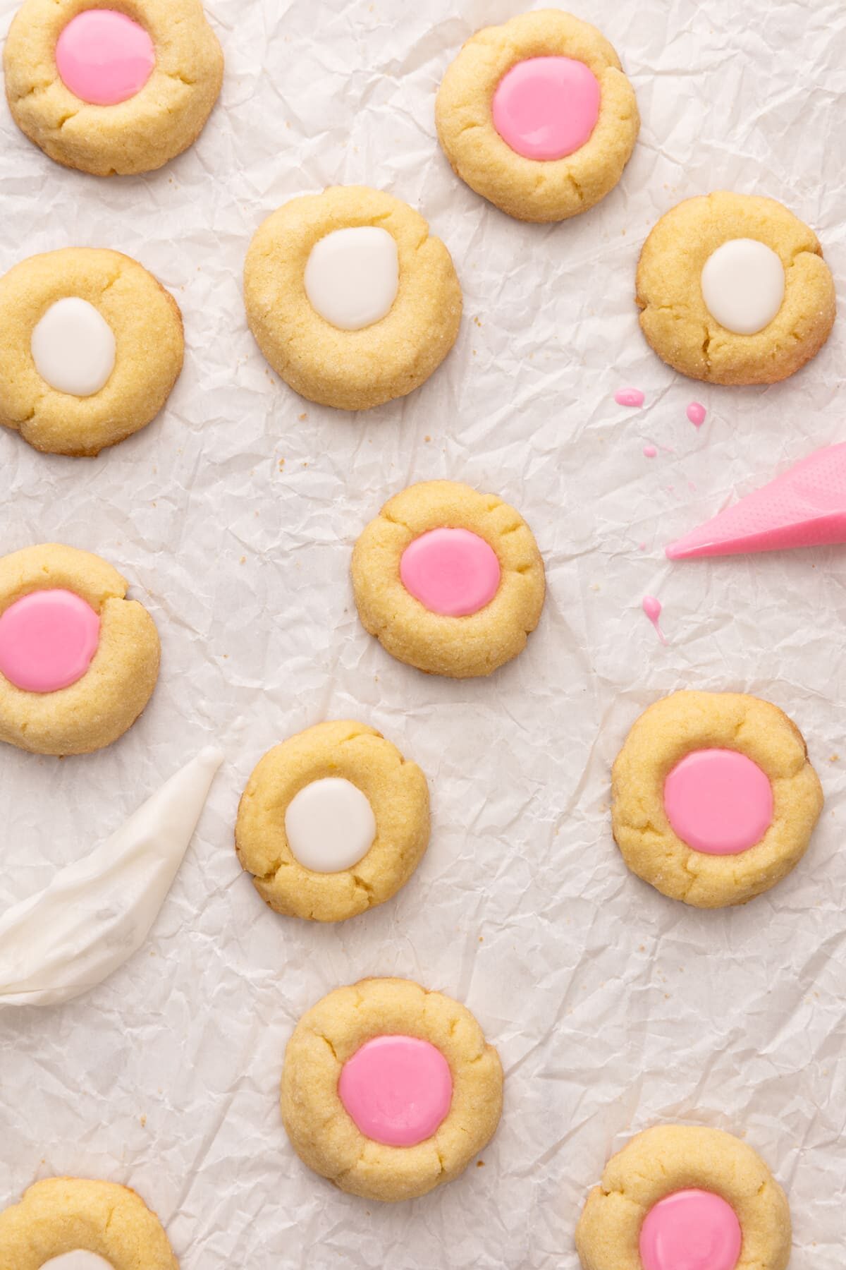 thumbprint cookies on parchment.