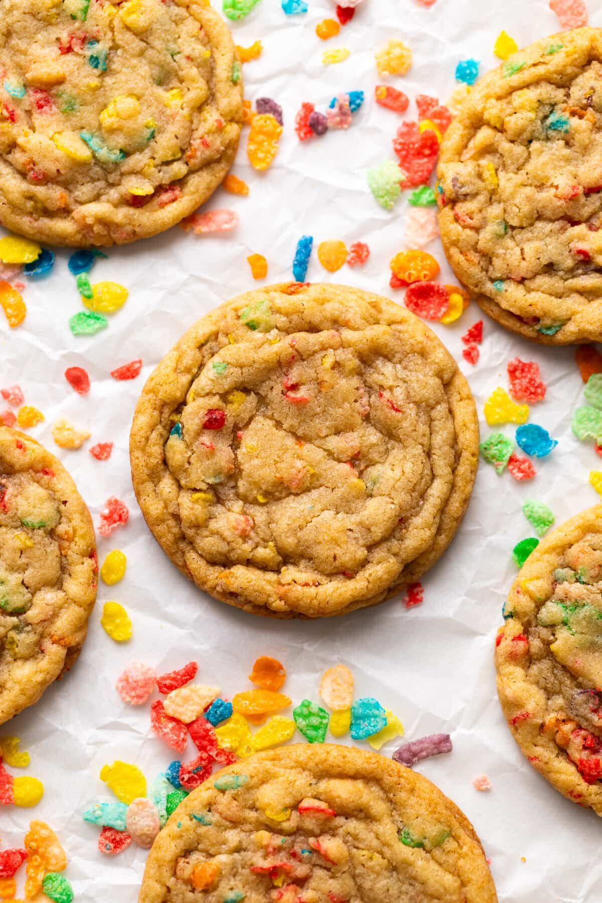 fruity pebble cookies on parchment up close.