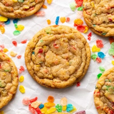 fruity pebble cookies on parchment up close.