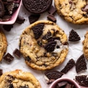 oreo chocolate chip cookies on parchment up close.